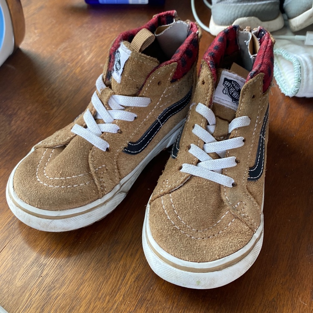 Brown high top vans zip